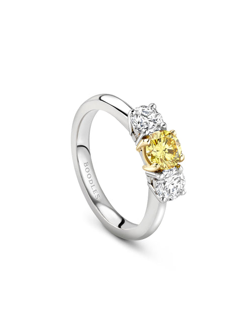 Trilogy Round Brilliant Yellow and White Diamond Platinum Ring