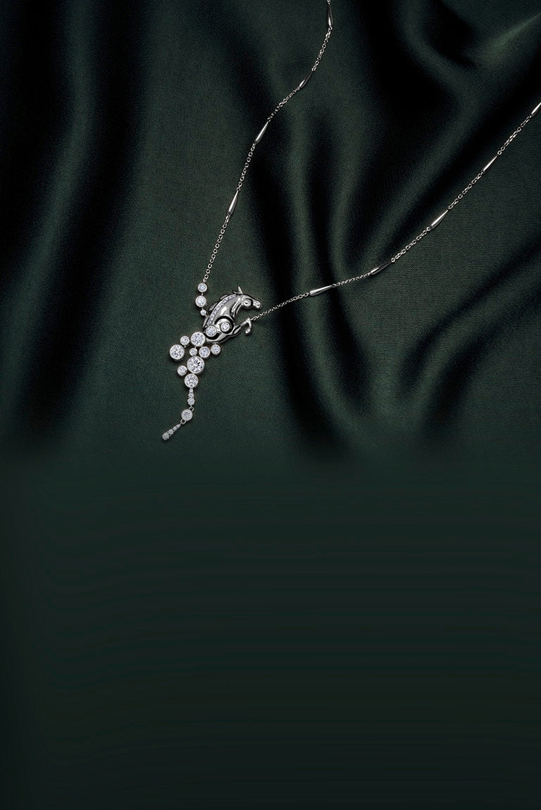 Lucky 'Gold Cup 100' Platinum Diamond Horse Pendant by Boodles.
