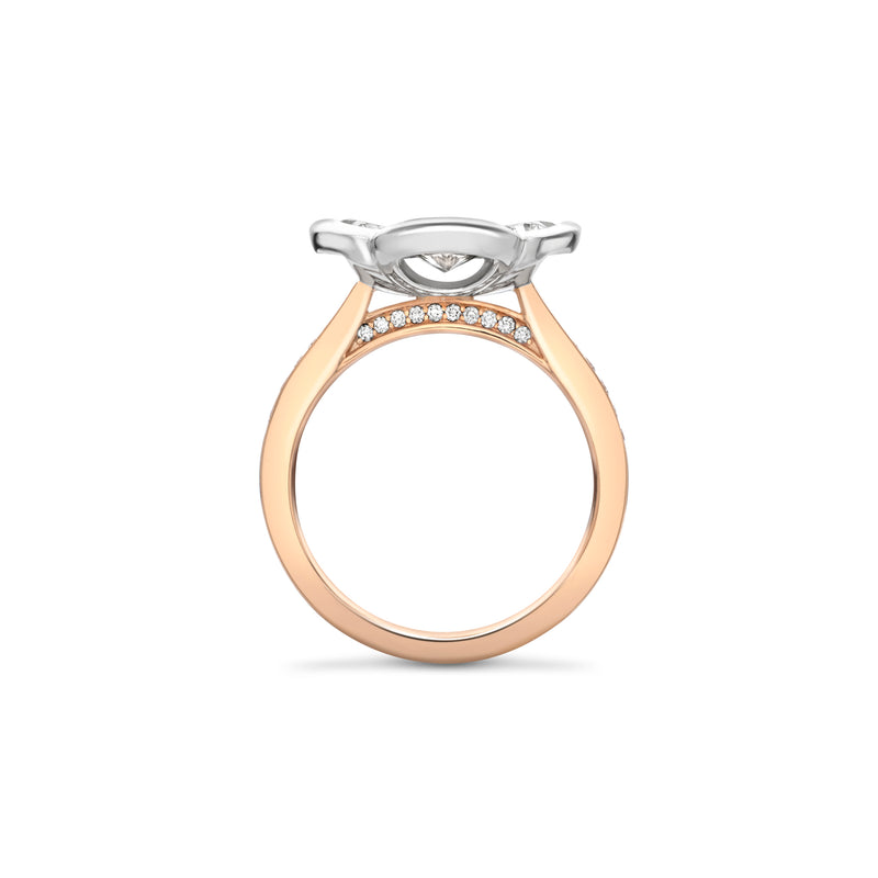 Side profile of the Boodles Posie ring featuring a rose gold band and a diamond-set platinum setting.