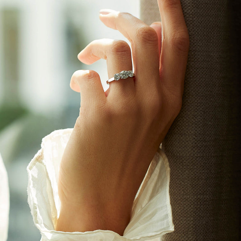 Trilogy Round Brilliant Platinum Diamond Engagement Ring