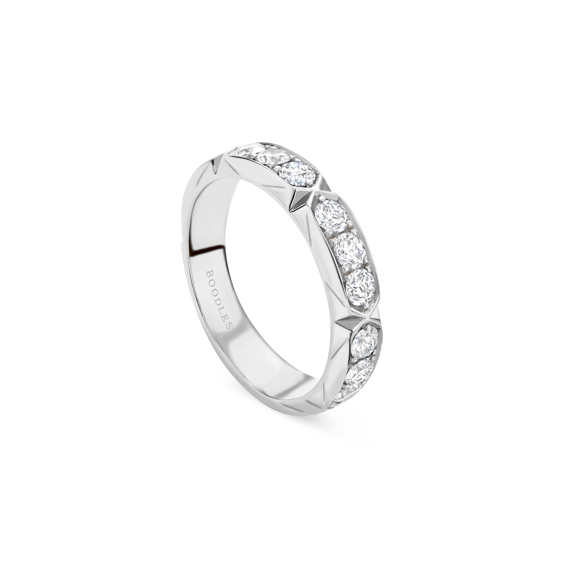 Large 18 carat white gold diamond ring from the Boodles Jazz collection, featuring a modern Art Deco eternity style design.
