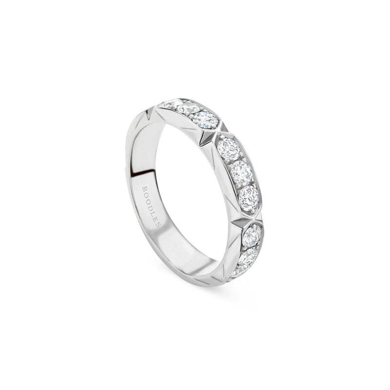 Large 18 carat white gold diamond ring from the Boodles Jazz collection, featuring a modern Art Deco eternity style design.