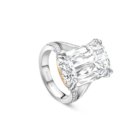 Ashoka split shoulder diamond platinum ring with a large center stone and pavé shoulders.