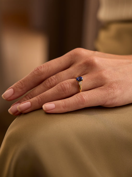 Trilogy Cupid Oval Sapphire Yellow Gold Ring