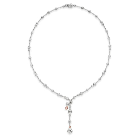 Raindance platinum and pink gold necklace with scattered white diamonds and a pink diamond drop pendant.