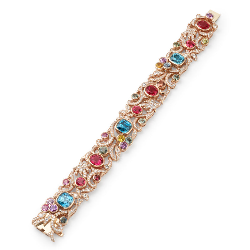 The Palace Collection Royal Damask rose gold bracelet with blue zircons, sapphires, and diamonds.