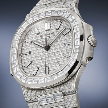 Patek Philippe Nautilus white gold watch Ref. 5811/1460G-001 with a diamond-paved dial and bezel.