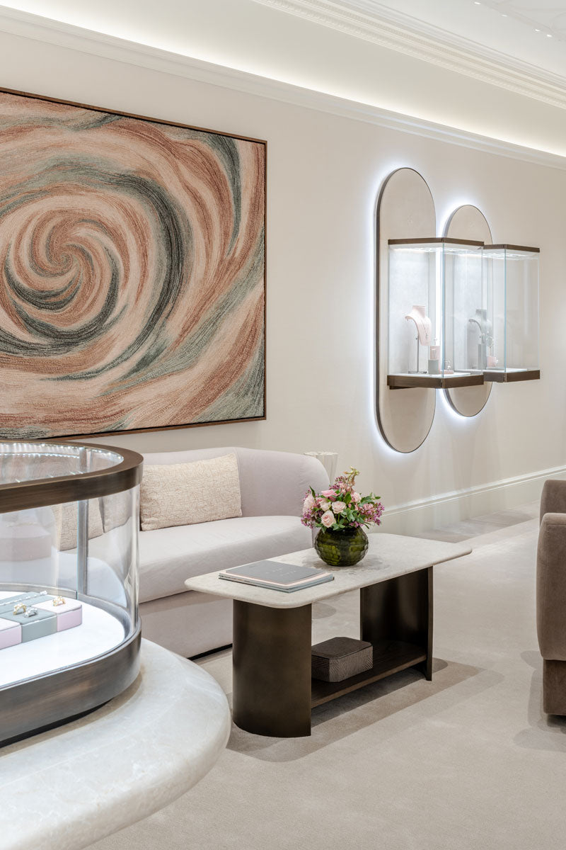 Interior of the Boodles Townhouse showing display cabinets along a panelled wall