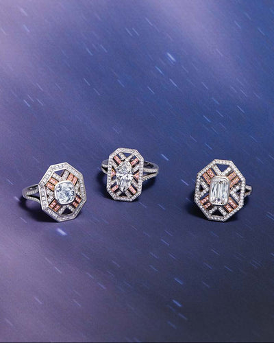 Three Fifth Avenue rings by Boodles featuring cushion, Ashoka and marquise cut diamonds with rose gold accents and argyle mine pink diamonds