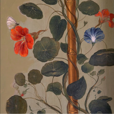 Artistic depiction of flowers, leaves, and a butterfly on a textured wall. Queen Charlottes cottage, Historic Royal Palaces, 