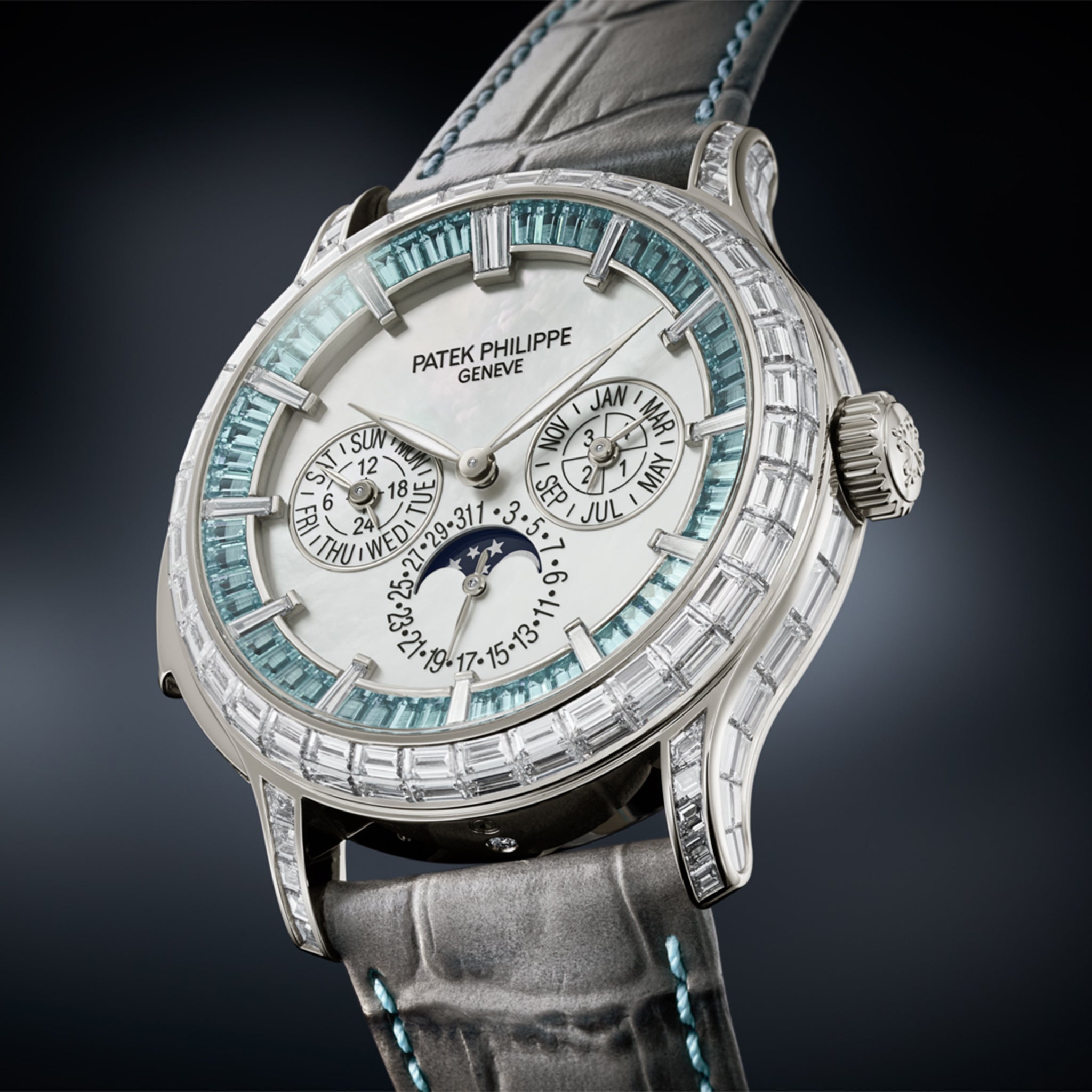 Patek Philippe Grand Complications platinum watch with baguette diamonds, Paraíba tourmalines, and a slate gray strap.