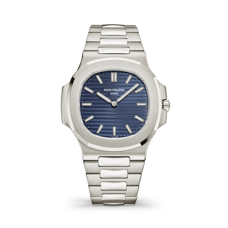 Patek Philippe Nautilus Ref. 5810/1G-001 watch in white gold with a sunburst blue embossed dial.