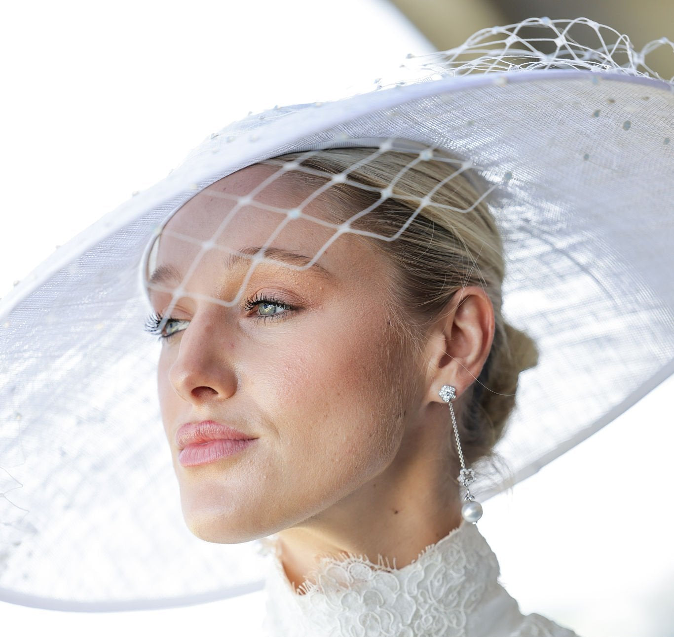 Leonora Smee at Royal Ascot wearing Boodles blossom pearl earrings