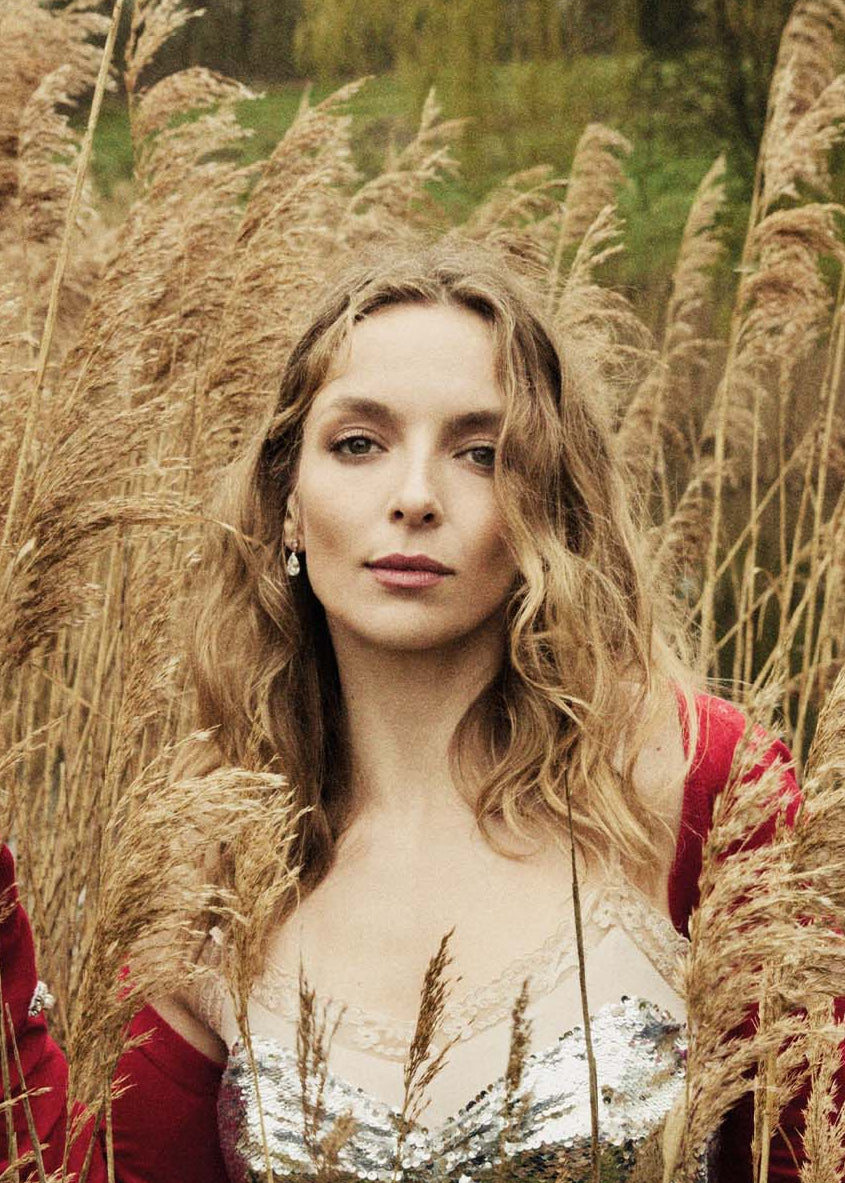 Jodie Comer wears the Classic Brilliant Pink Diamond and Pear Diamond Drop Earrings in the english countryside magazine photoshoot.