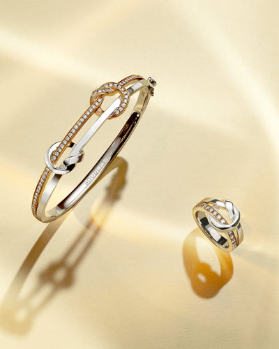 The Knot White and Rose Gold Diamond Bangle by Boodles