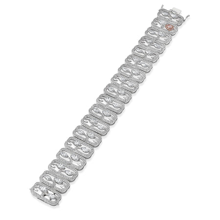 Secret Garden New Beginnings platinum bracelet set with marquise white diamonds and a pink oval diamond.