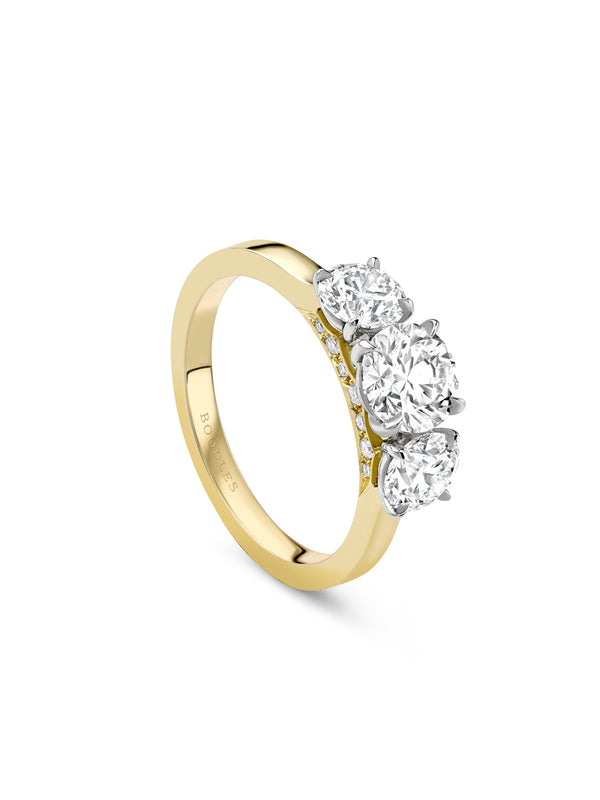 Trilogy Round Brilliant Yellow Gold Diamond Engagement Ring
